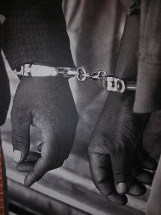 boy jumping wire fence